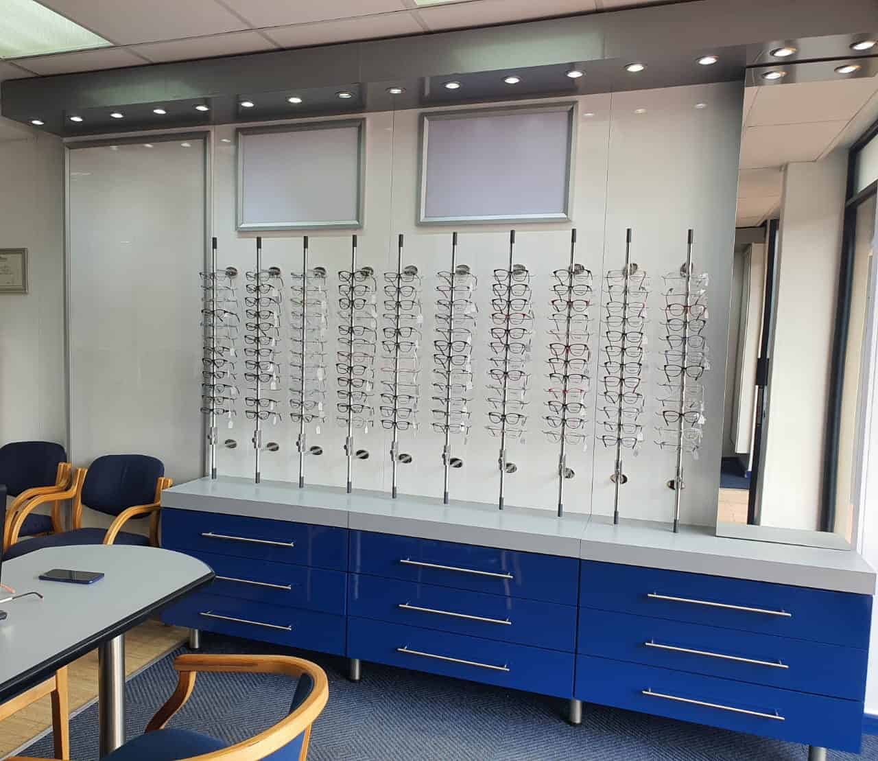Variety of stylish eyeglasses and frames on display.